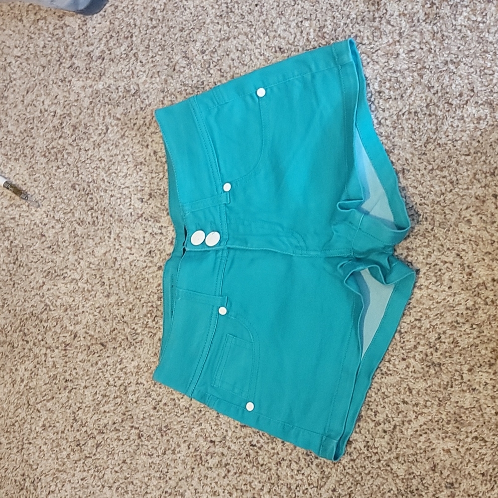 Turquoise and white button shorts